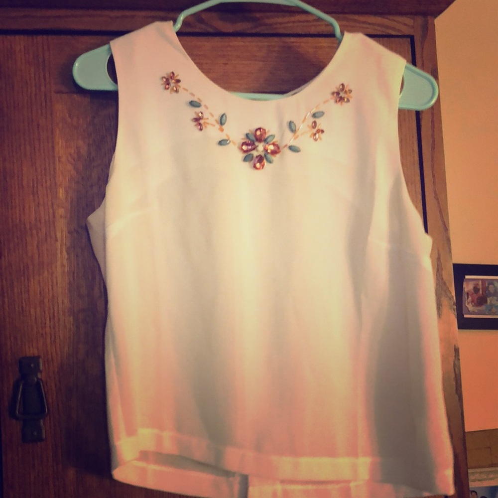 White crop top and beautiful details on neckline